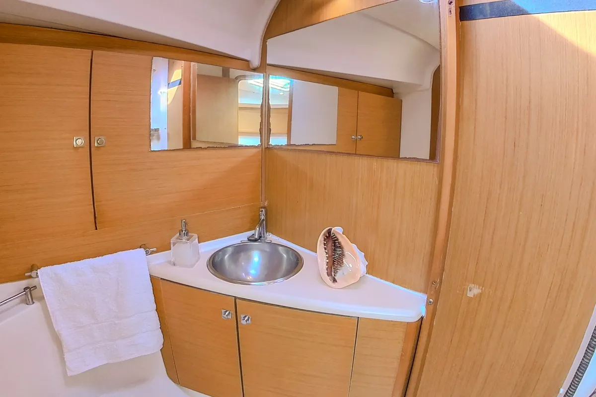 Head on Guji, a Jeanneau Sun Odyssey 44 i sailboat at Isla Aguja Cabins San Blas, Panama