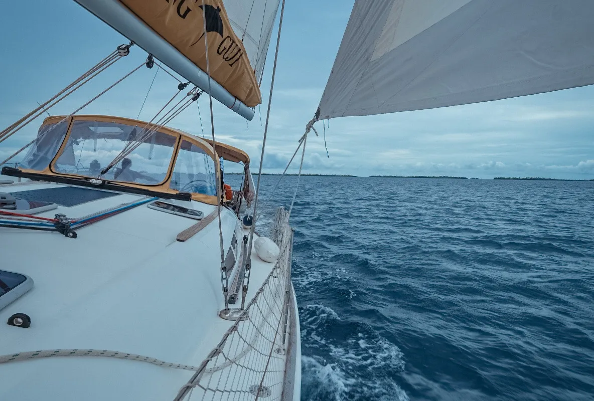 Exterior view of Guji, a Jeanneau Sun Odyssey 44 i sailboat at Isla Aguja Cabins San Blas, Panama