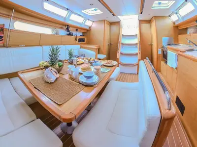 Salon of Guji, a Jeanneau Sun Odyssey 44 i sailboat at Isla Aguja Cabins San Blas, Panama