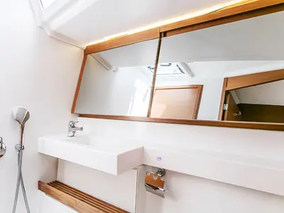 Head on Indira, a Jeanneau Sun Odyssey 440 sailboat at Olbia, Italy