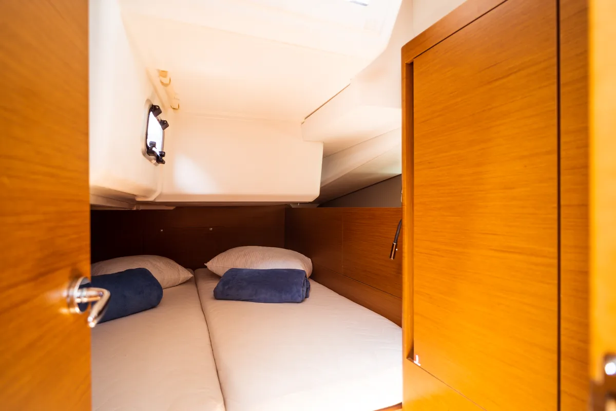 Cabin on Indira, a Jeanneau Sun Odyssey 440 sailboat at Olbia, Italy