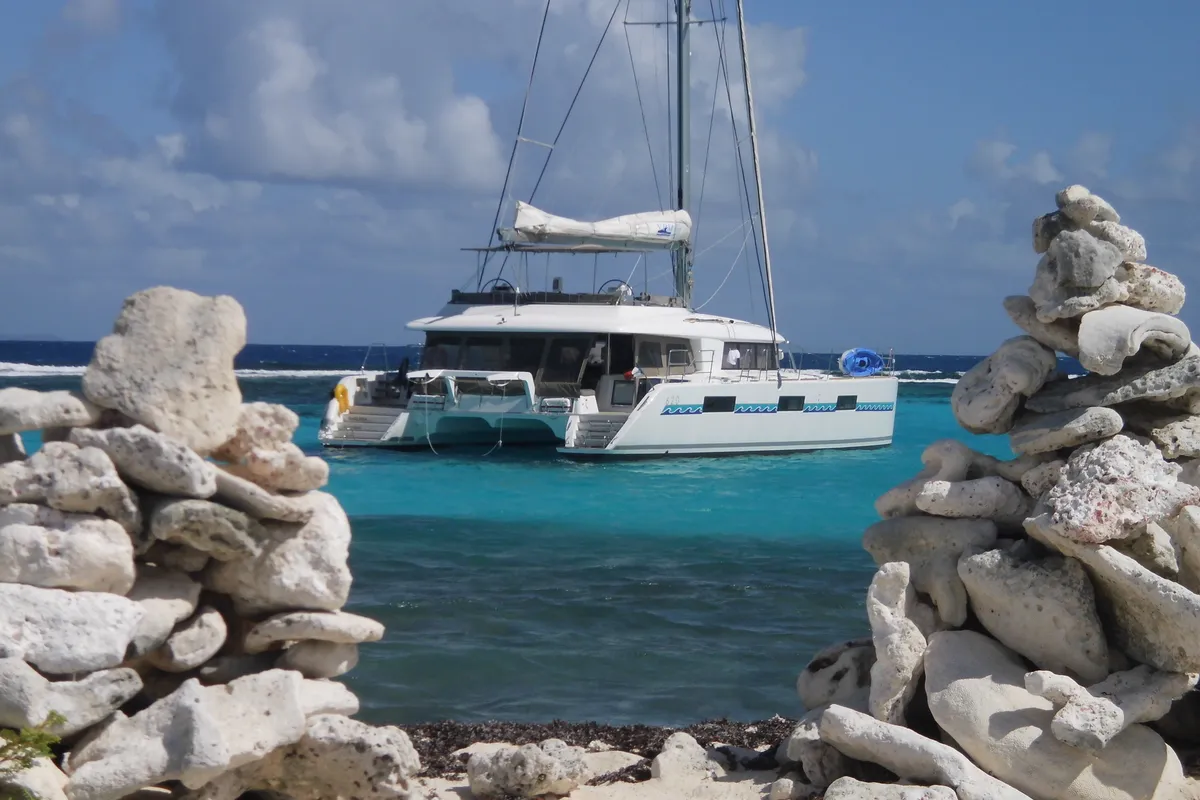 Exterior view of Marlena, a Lagoon 620 catamaran at Roche Caiman, Seychelles