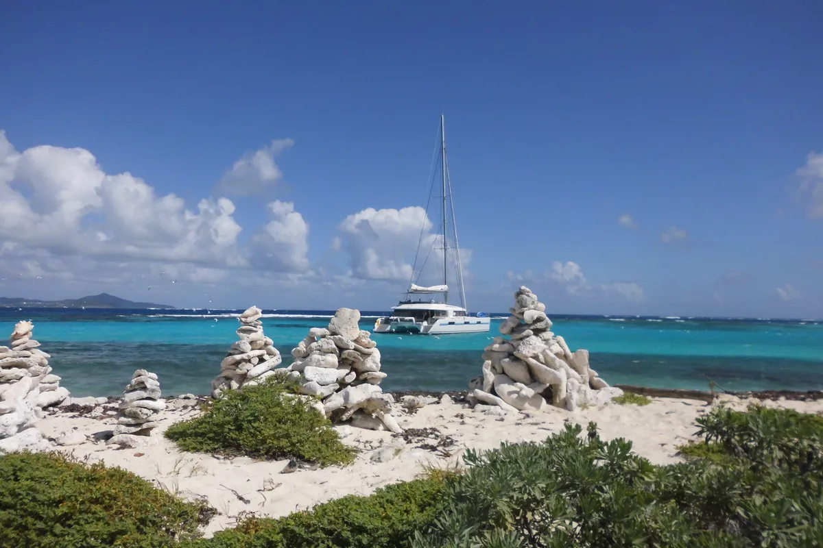 Exterior view of Marlena, a Lagoon 620 catamaran at Roche Caiman, Seychelles