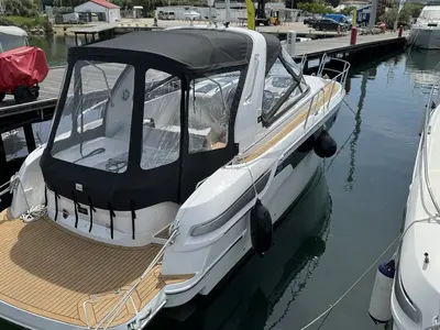 Exterior view of Elvie, a Bavaria S29 motorboat at Punat, Croatia