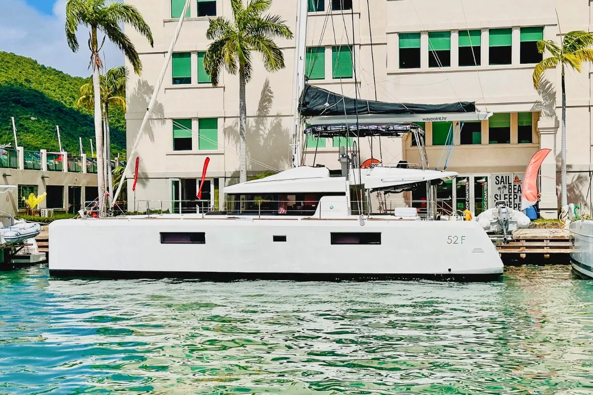 Exterior view of LA DOLCE VITA, a Lagoon 52F catamaran at Sant Antoni de Portmany, Spain