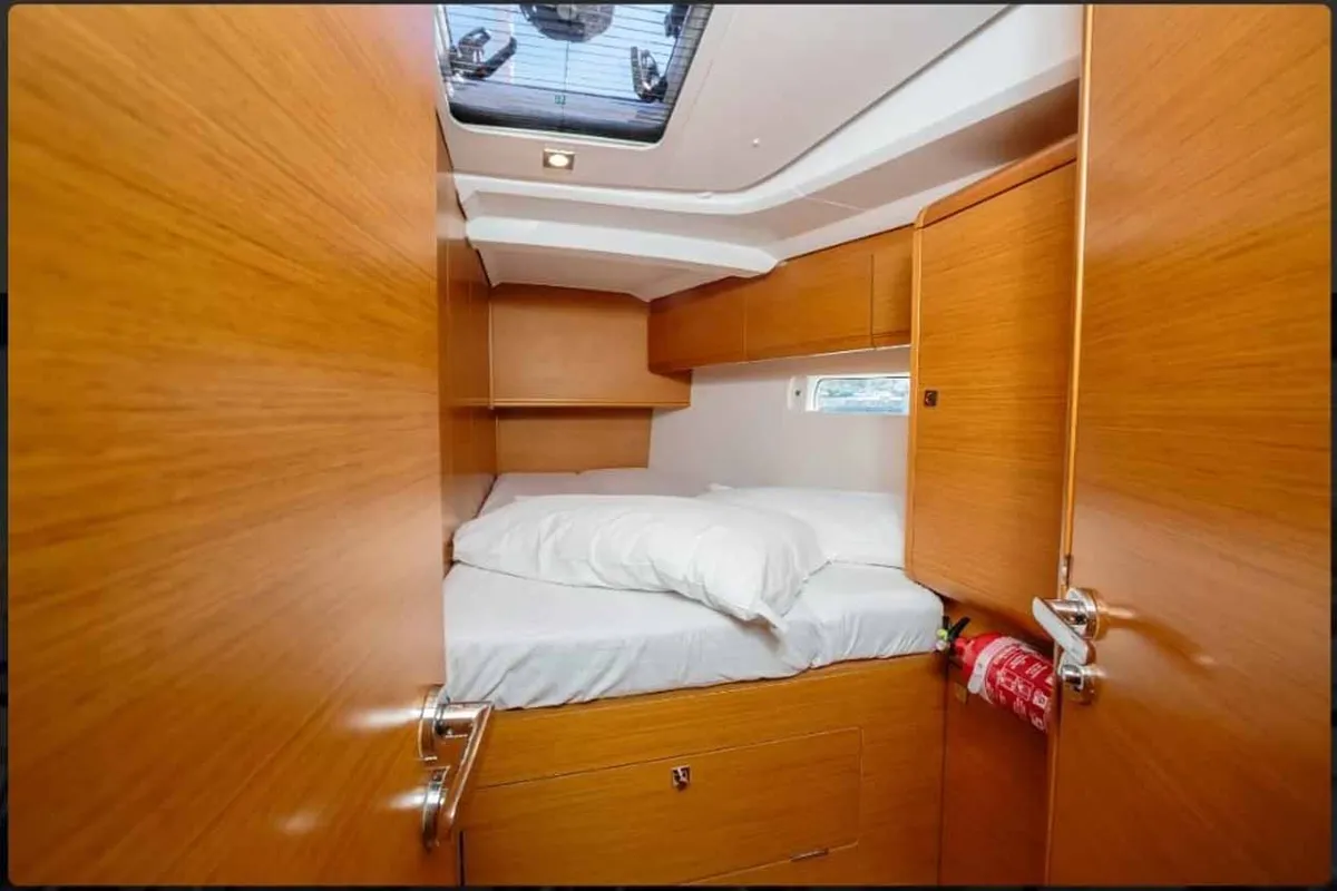 Cabin on Kalos, a Jeanneau Sun Odyssey 519 sailboat at Tropea, Italy