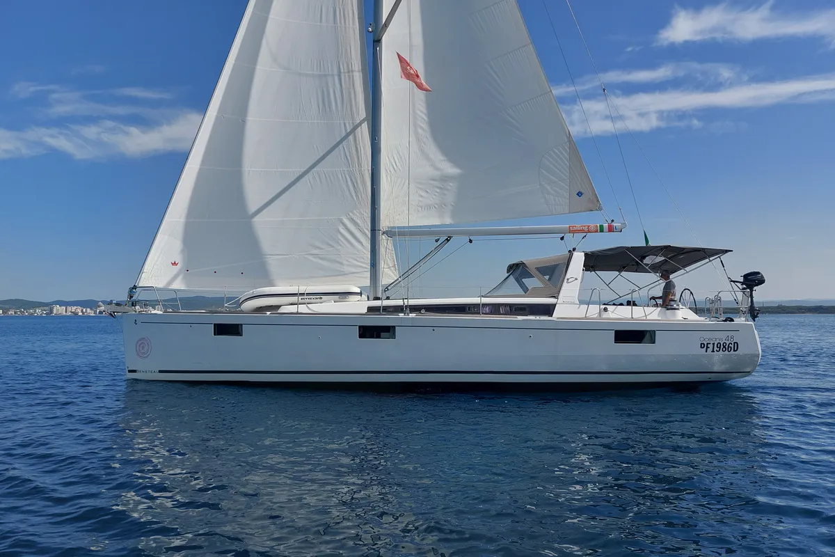 Exterior view of Orchidea, a Beneteau Oceanis 48 sailboat at Puntone di Scarlino, Italy