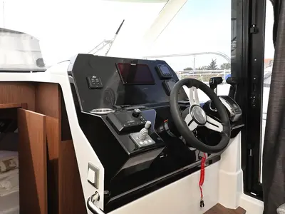 Cockpit of Tango, a Beneteau Antares 11 Fly OB motorboat at Pirovac, Croatia