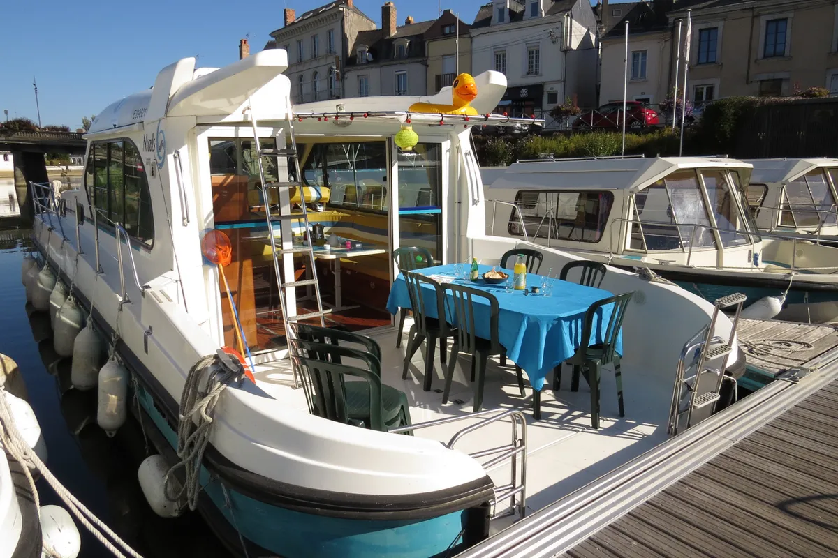 Exterior view of Alto, a Nicols Sedan 1310 motorboat at Sablé-sur-Sarthe, France