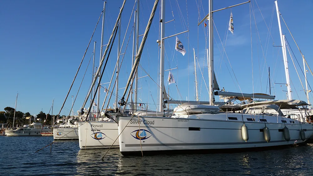 Exterior view of Silver Cloud, a Bavaria Cruiser 50 sailboat at Llucmajor, Spain