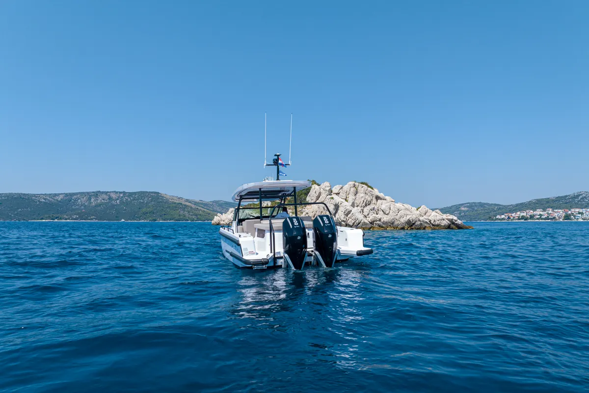Exterior view of Opijum, a Axopar 37 Sun Top motorboat at Seget Donji, Croatia