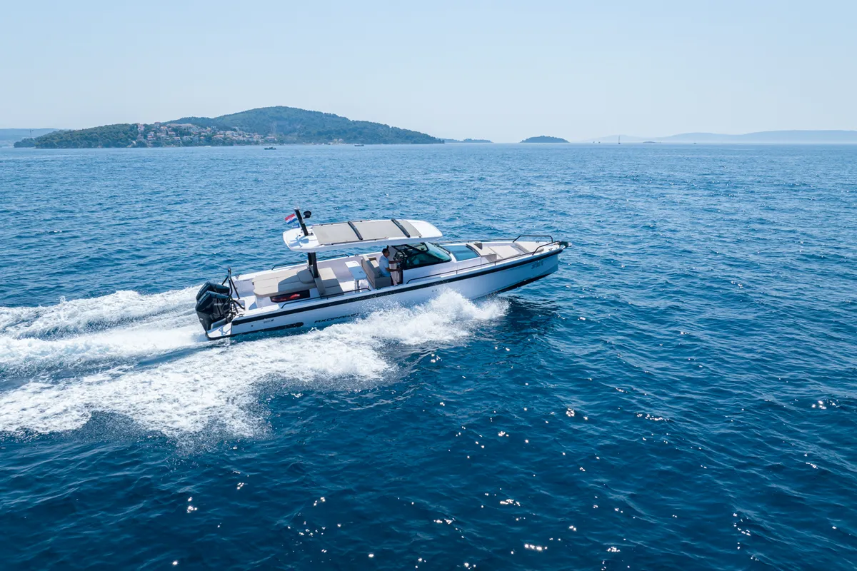 Exterior view of Opijum, a Axopar 37 Sun Top motorboat at Seget Donji, Croatia
