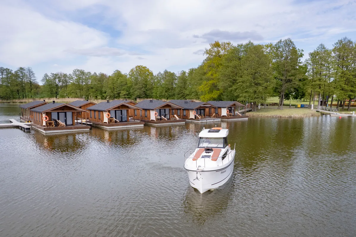 Exterior view of Wajda, a Northman Nexus Revo 870 Prestige motorboat at Sztynort, Poland