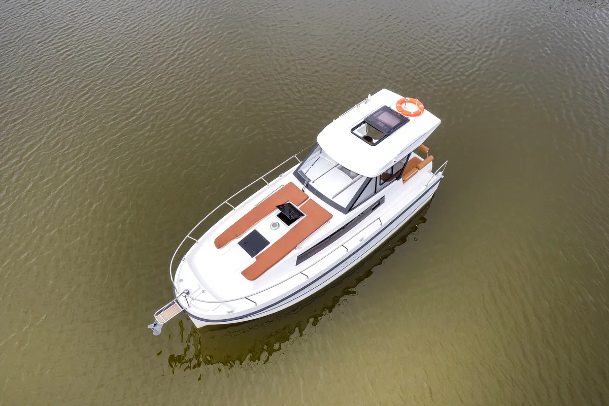 Exterior view of Wajda, a Northman Nexus Revo 870 Prestige motorboat at Sztynort, Poland