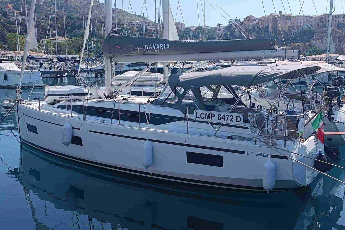 Exterior view of Le petit Mami, a Bavaria C38 sailboat at Tropea, Italy