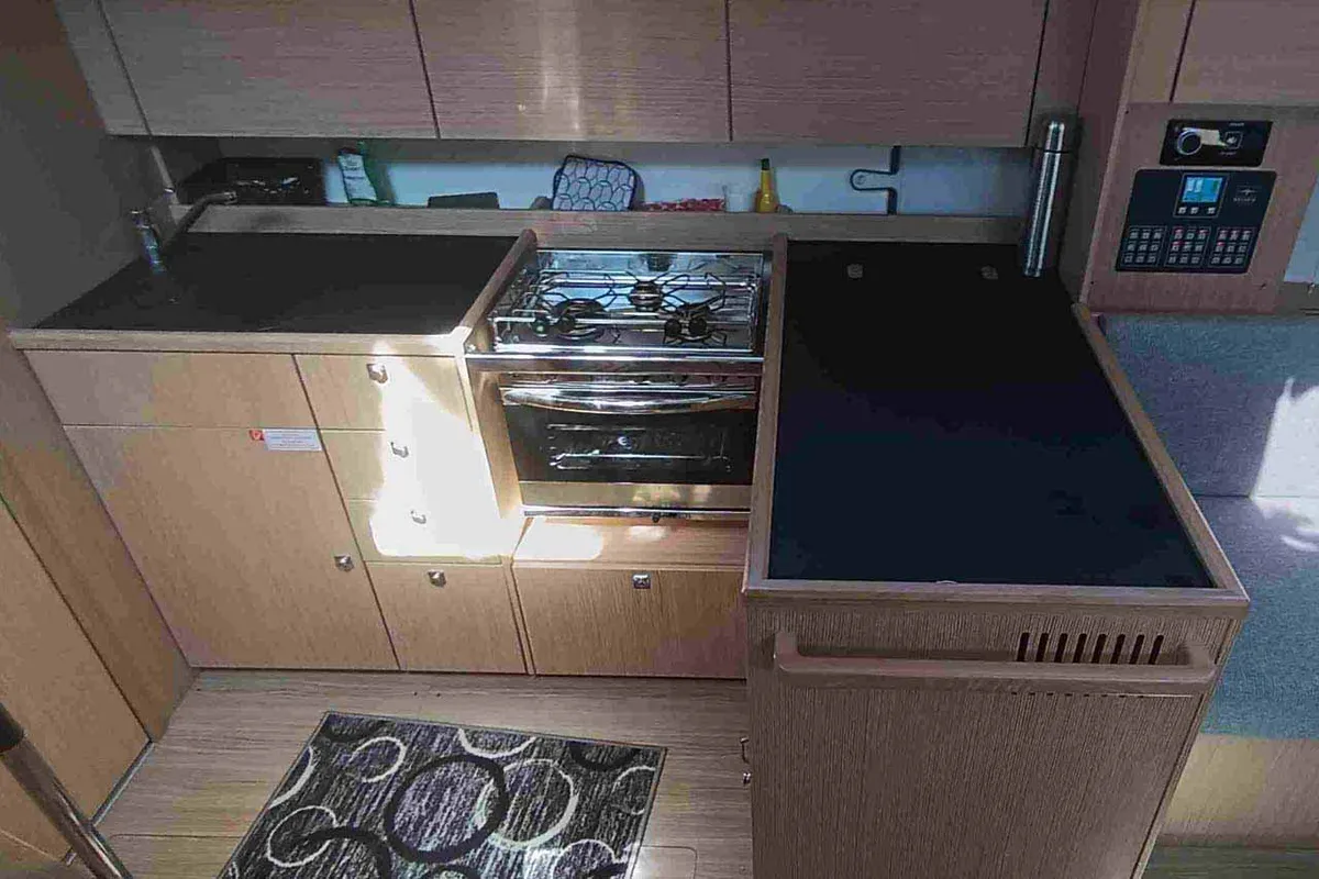 Galley of Le petit Mami, a Bavaria C38 sailboat at Tropea, Italy