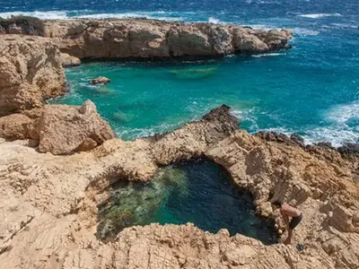 Vorini Spilia Bay in Agios Georgios, Greece — photo 3