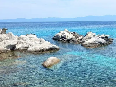rock in the water - Photo 5